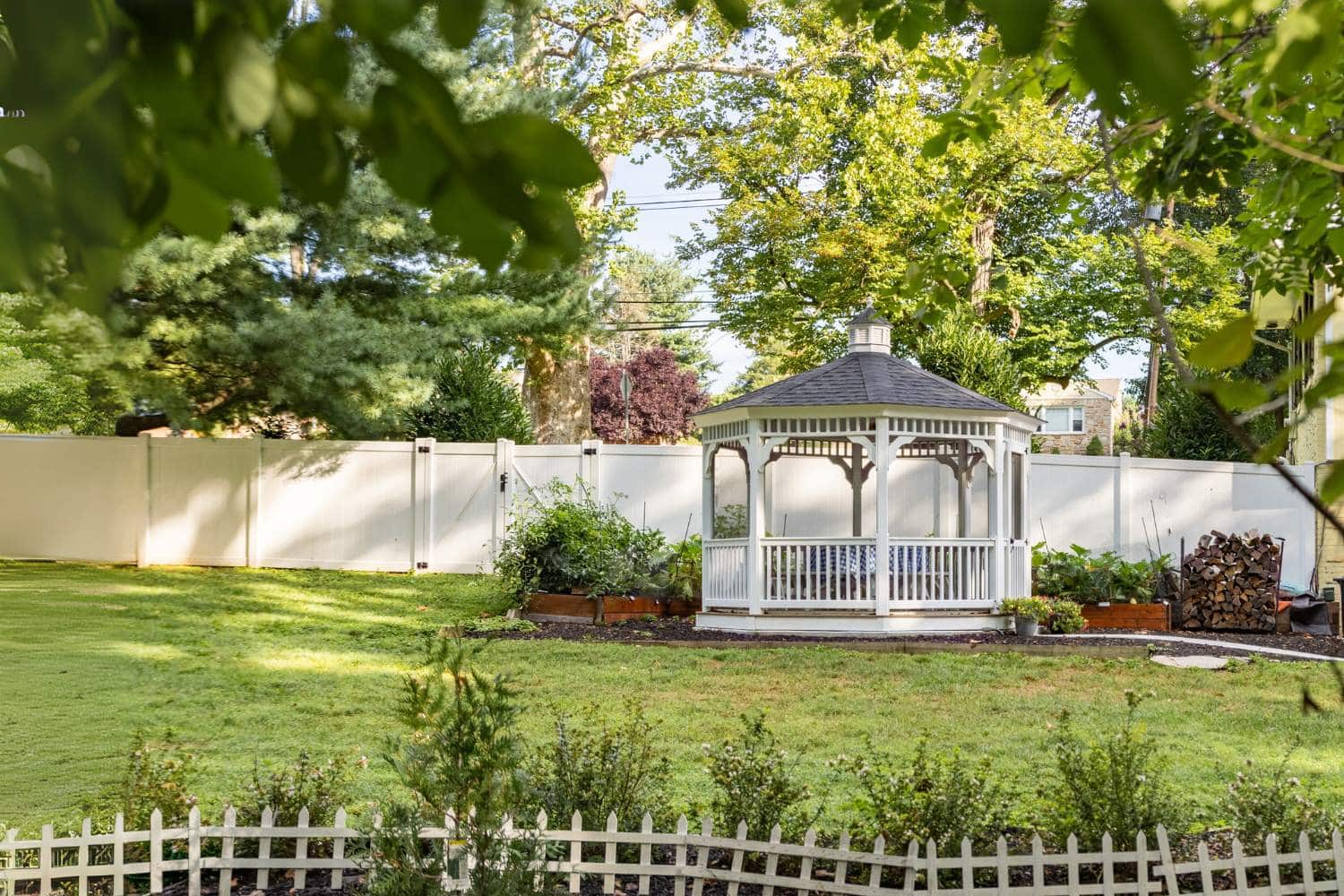 Vinyl octagon gazebo with shingle roof by Waterloo Structure serving PA DE NJ MD